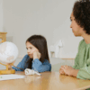 Agitated young girl with parent, representing challenges of managing ODD in children