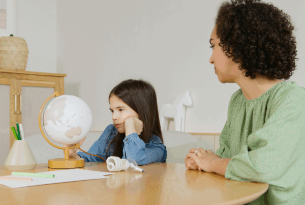 Agitated young girl with parent, representing challenges of managing ODD in children